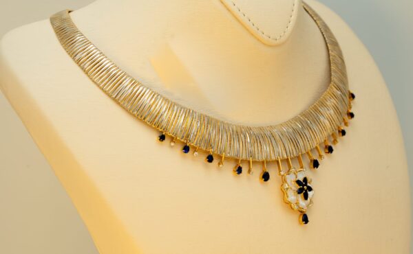 21k necklace  Diamonds, sapphire, and mother of pearl